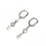 KEYCODE | Anneaux argentés avec charms et zircons