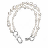 CLUSTER NECKLACE · Gargantilla contemporánea doble de perlas statement