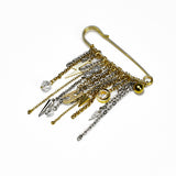 MANIFESTO | Broche dorado con cadenas en acero y charms
