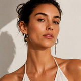FROST Acier inoxydable | Boucles d'oreilles créoles asymétriques avec chaîne et zircone