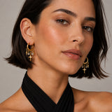 ICONIC | Boucles d'oreilles dorées avec croix et cristaux