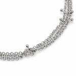 Detalle del collar RIPPLE con cadenas y piercings de acero – Kirei Jewellery